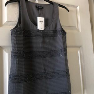 Very pretty top with sequins and tucks